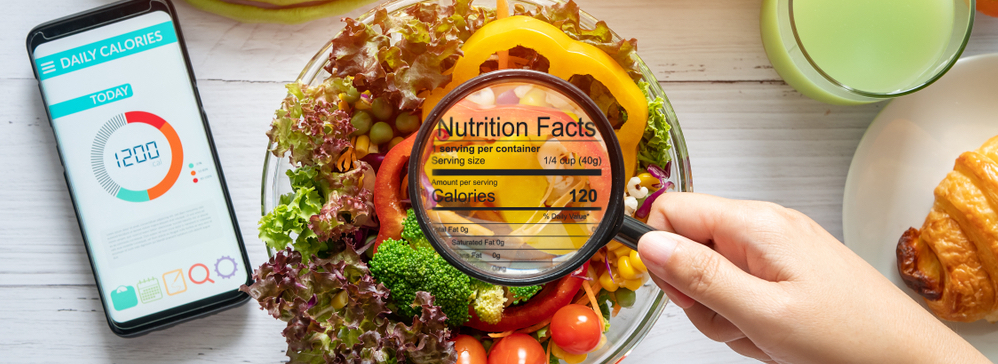 Nutritional,Information,Concept.,Hand,Use,The,Magnifying,Glass,To,Zoom Personal-training-Sandringham